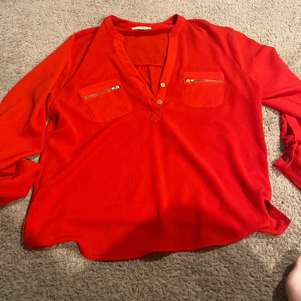 Woman’s blouse size Large
